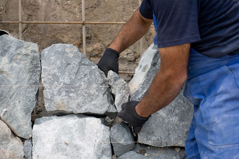 Continue setting the course: How To Build a Stone Wall with Mortar