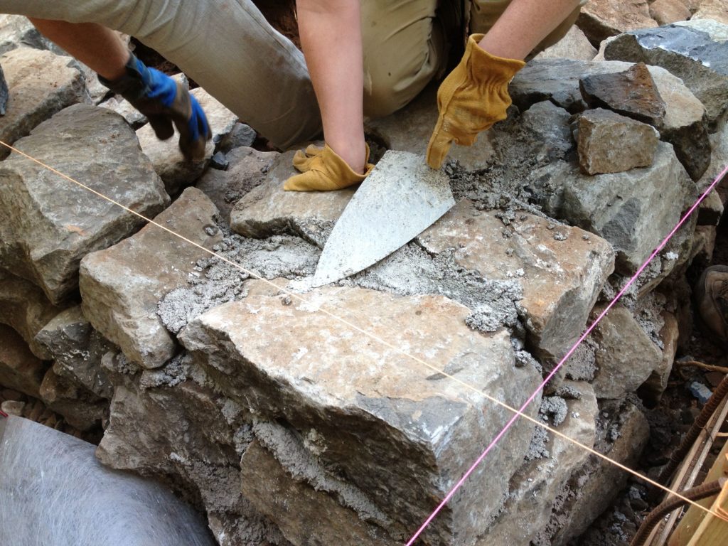 Smooth strike joints: How To Build a Stone Wall with Mortar